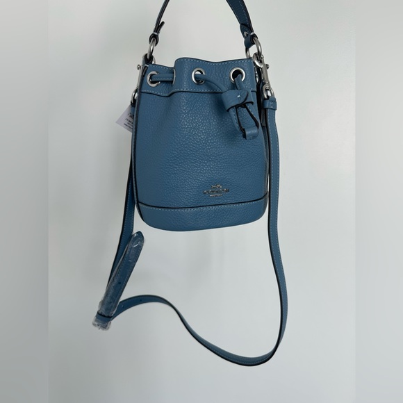 Coach light blue bucket bag
NWT prestine condition
Original price $328 - Picture 4 of 6